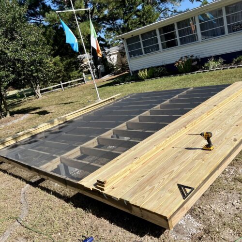 Wood-Deck-Construction-North-Carolina Professional ground-level wood deck construction by Titan Decks in North Carolina.