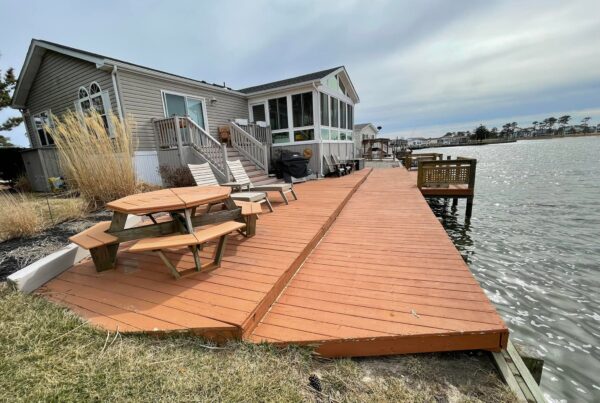 Before photo of an aging wood deck and dock North Carolina.