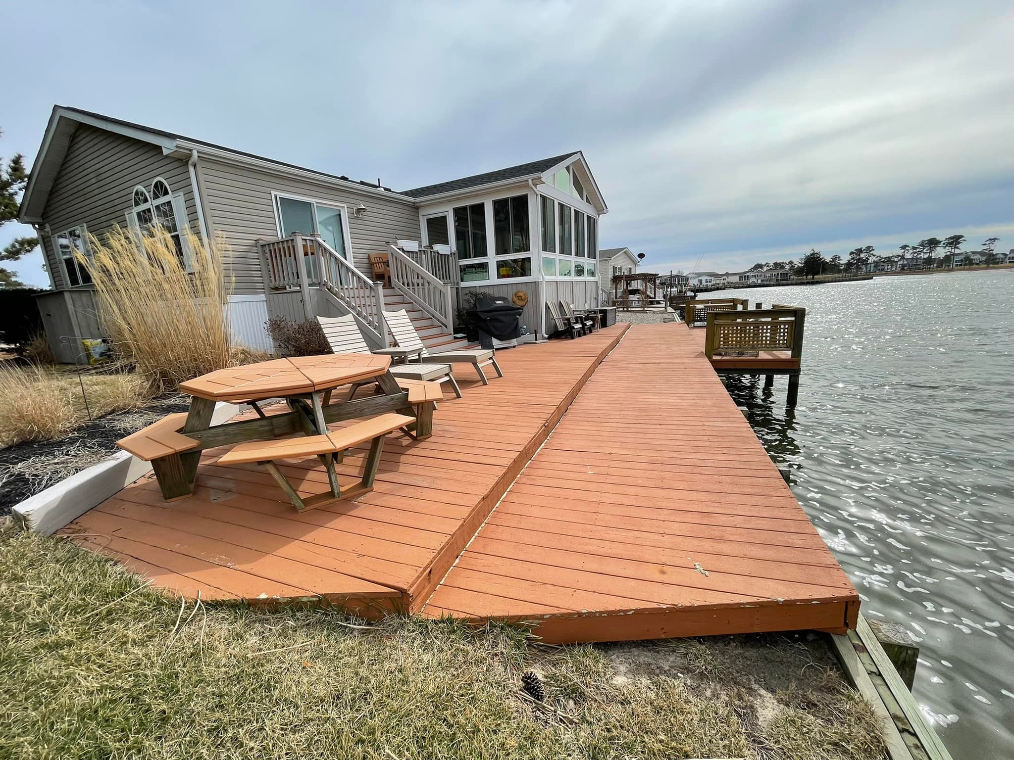 Before photo of an aging wood deck and dock North Carolina.