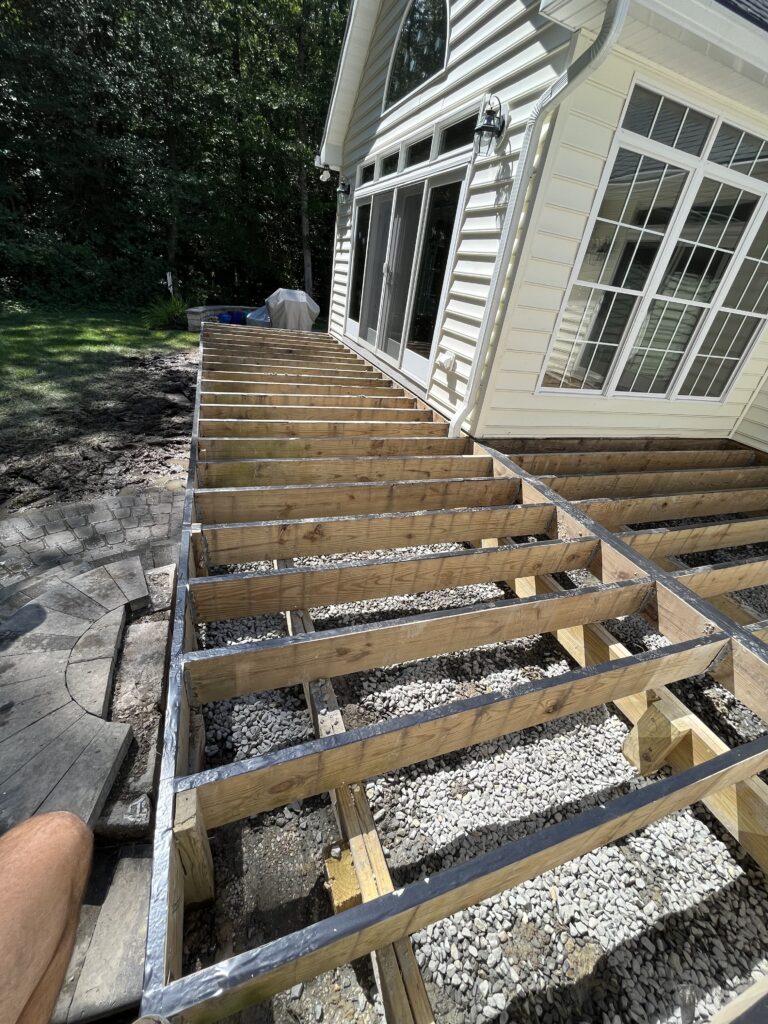 Existing Deck Framing With Joist Tape to Help Preserve the Structure