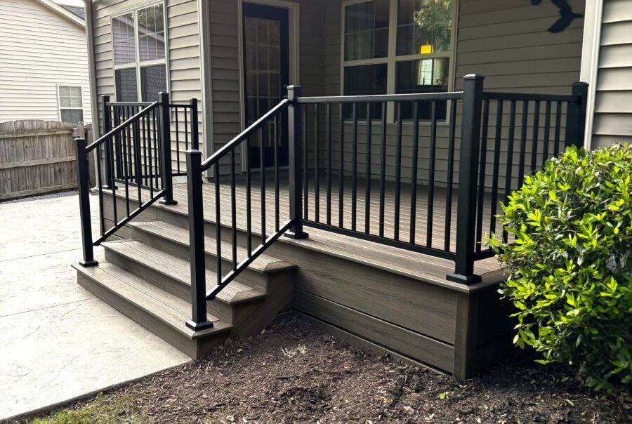Completed Trex Transcend Toasted Sand deck with black composite railings in Angier, NC.