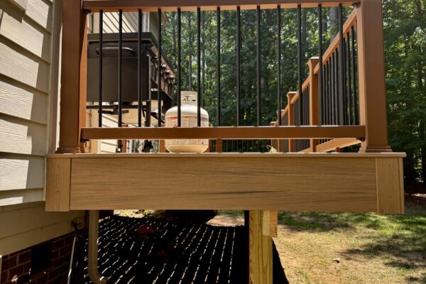 Custom Trex Golden Hour composite deck resurface and extension in Mount Holly NC - Photo 11