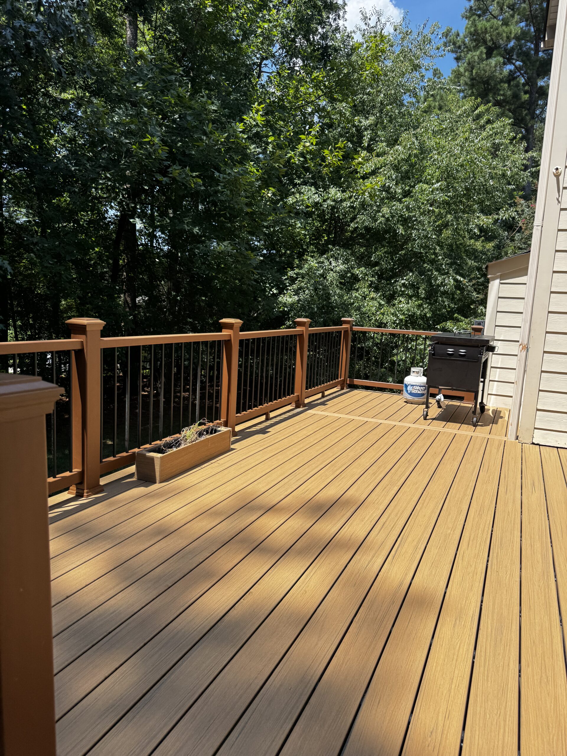 Custom Trex Golden Hour composite deck resurface and extension in Mount Holly NC - Photo 8