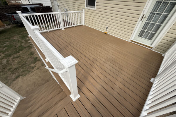 Large custom Trex composite deck with white railing