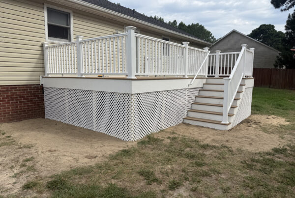New custom composite deck with white railing built by Titan Decks in Cameron, NC