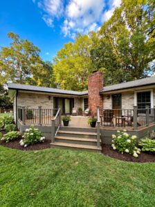 TimberTech composite deck with gray railing and stone home exterior in North Carolina
